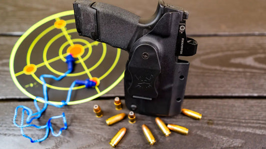 Clinger Core System holster shell with handgun, ammo, and target