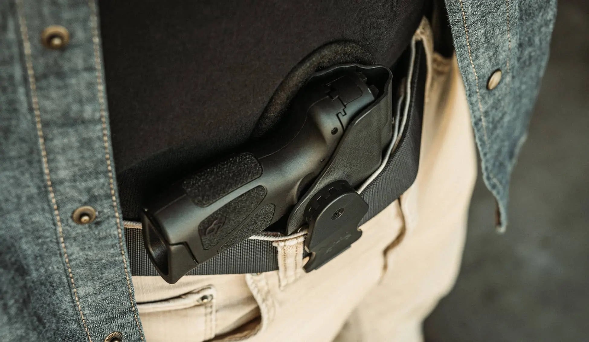 Clinger holster worn in a practical everyday carry setting